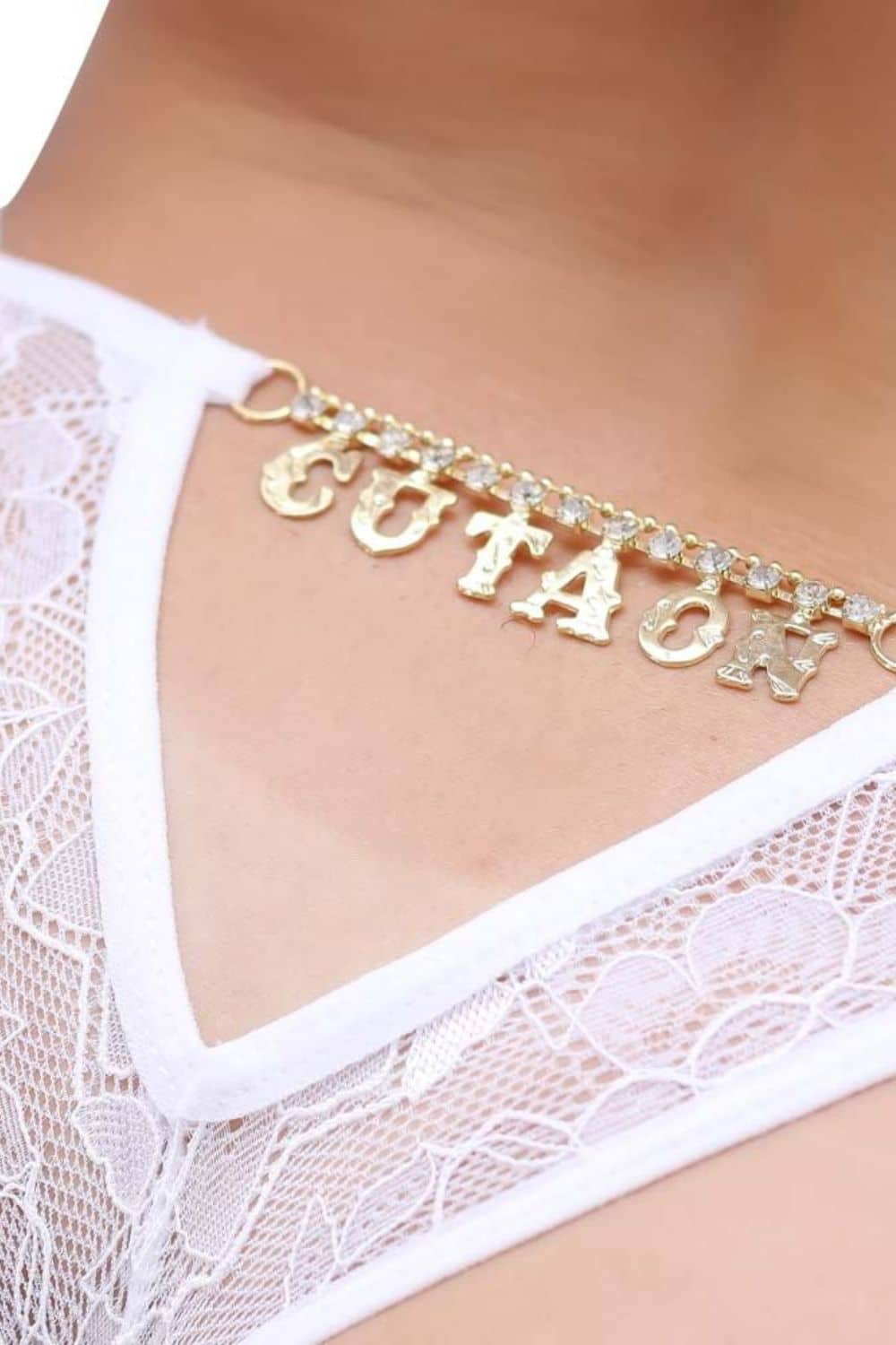 15274762333-calcinha-fio-dental-branca-com-escrita-cu-ta-on-strass-01-2.jpg Calcinha Fio Dental Branca com escrita Cú ta on Strass - Imagem 1