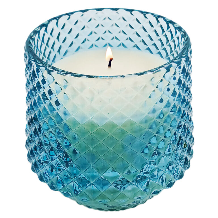 Vela aromática em vidro Livon azul luxo de 8x7cm sobre superfície decorativa
